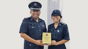 Mr Matyasir Zairani and his daughter Nuharina sharing a proud moment at this year’s NPCC Annual Parade, celebrating East Spring Secondary School’s NPCC unit being awarded Distinction for overall unit proficiency in 2023.